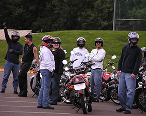Photo of motorcyclists in a class
